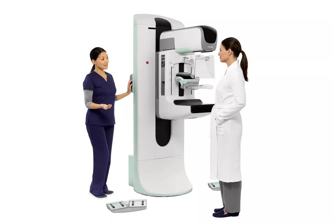 medical 3D imaging machine with technician and healthcare professional